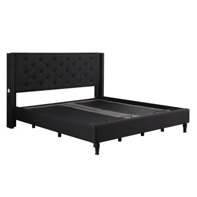 Levasy Upholstered Wingback Bed