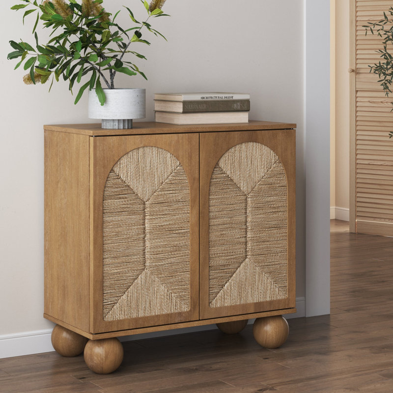 Coran Boho Storage Cabinet with Ball-Style Feet and Seagrass Door Panels, Natural