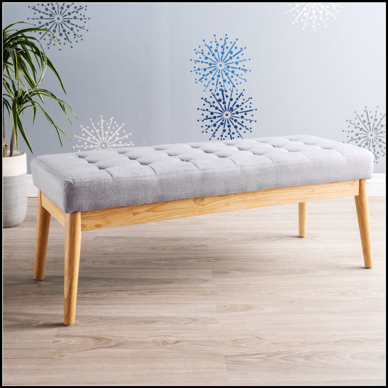 Banc de repose-pieds Mid-Century moderne avec un design capitonné et des pieds en bouleau massif, confortable et multifonctionnel