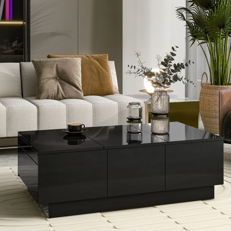 Table basse noire avec fonction extensible et 2 espaces de rangement cachés pour la chambre à coucher
