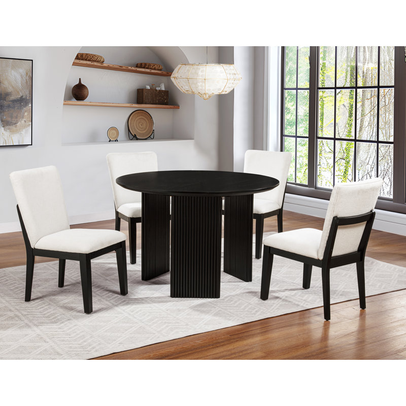 Norlina Taylors 46" Round With Fluted Base Dining Table, Black