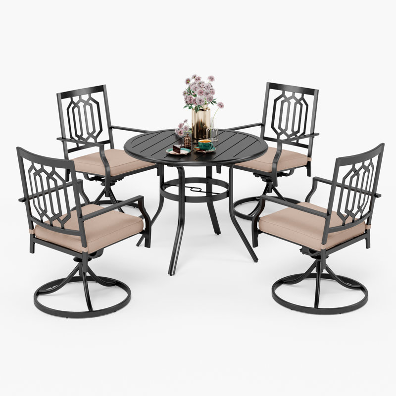 Argyri 4 - Person Patio Dining Set with Round Table , Cushions Included