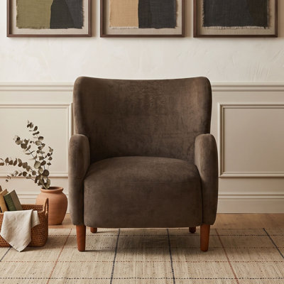 Fauteuil club à oreilles rembourré