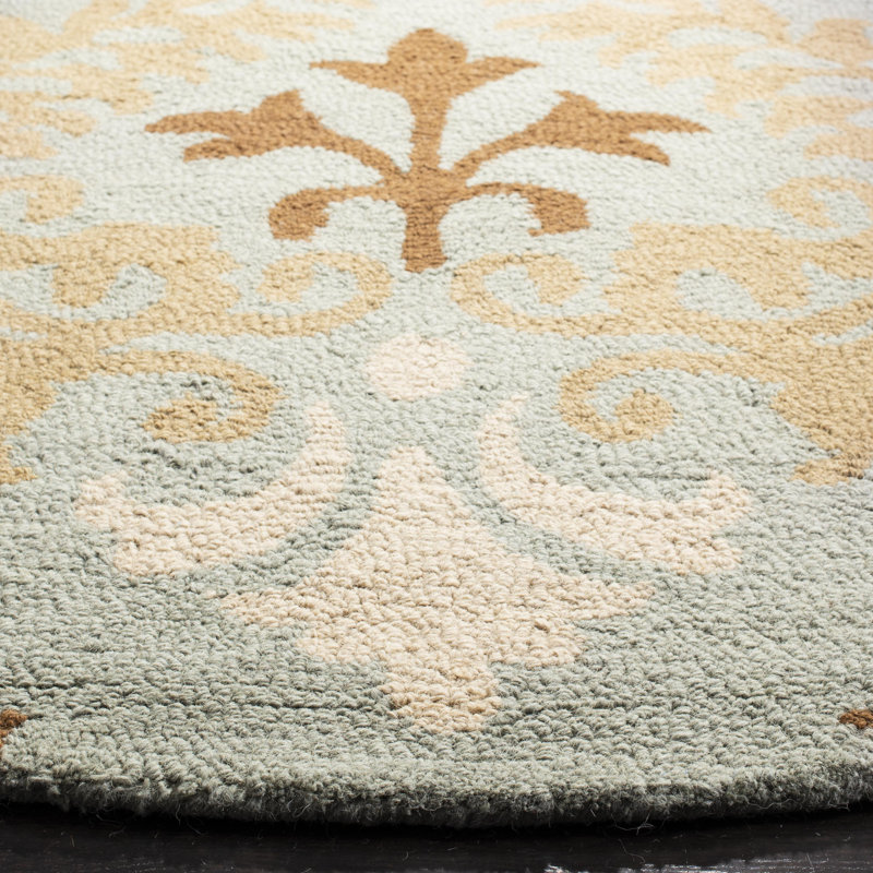 Jahiem Floral Handmade Looped Wool Blue Area Rug, Round 6'