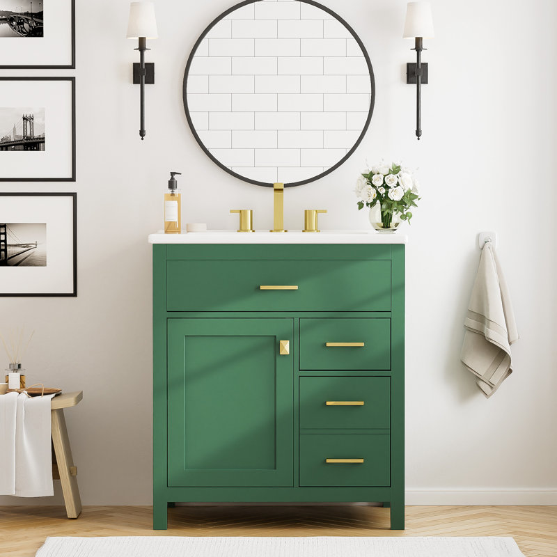 Meuble-lavabo de 30 pouces avec lavabo en céramique et nombreuses options de rangement. Idéal pour les petits espaces. Fabriqué en bois massif. Poignées attrayantes munies d'une fermeture en douceur. Comprend une armoire à tablette réglable