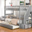 Lit simple superposé au dessus d'un lit gigogne gris, 4 tablettes de rangement, matelas d'une épaisseur de 6 po et d'une épaisseur de 6 pi