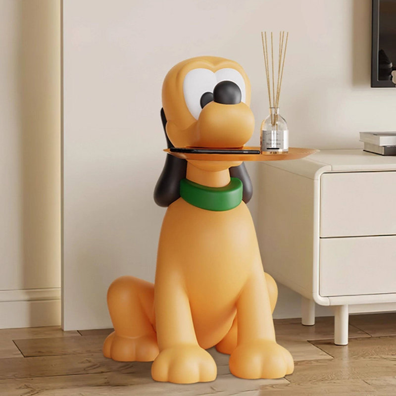 Objet décoratif en forme de chien jaune