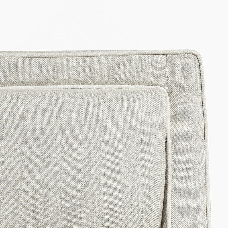 Fauteuil crème en polyester à 4 pieds avec coussin