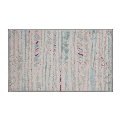 Tapis gris lavable à la machine