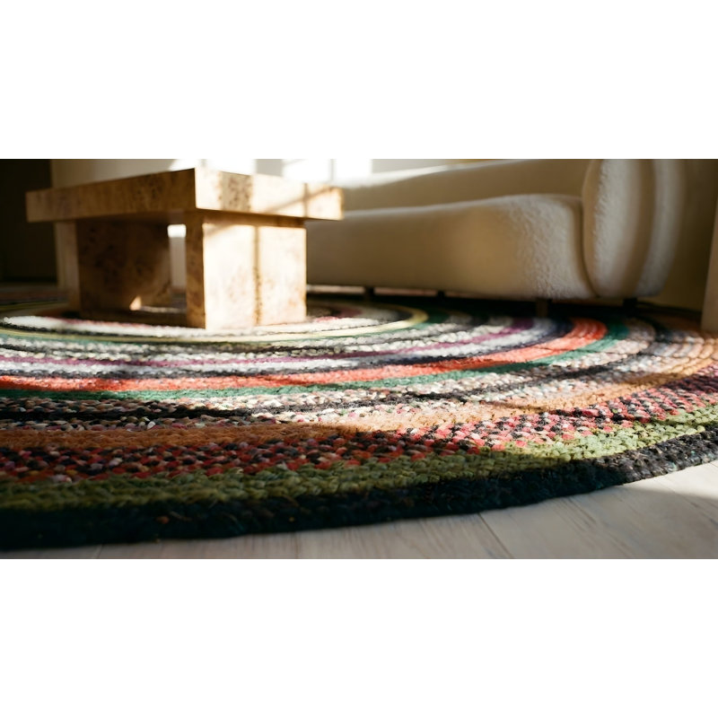 Tapis rond tressé antique à motif circulaire