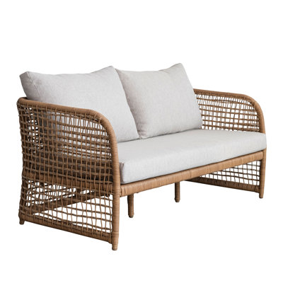 Longue chaise intérieure / extérieure en osier de plastique tissé à la main avec coussins en tissu