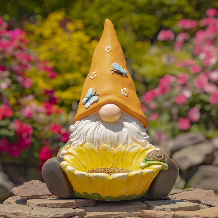 https://assets.wfcdn.com/im/22428808/resize-h755-w755%5Ecompr-r85/2532/253232929/Magnesium+Garden+Gnome+Sitting+with+Giant+Flower+and+Orange+Hat+with+Butterflies+%22The+Smallfries%22.jpg