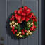 Holiday Evergreen Wreath with Gold and Red Ornaments and Red and Gold Bow