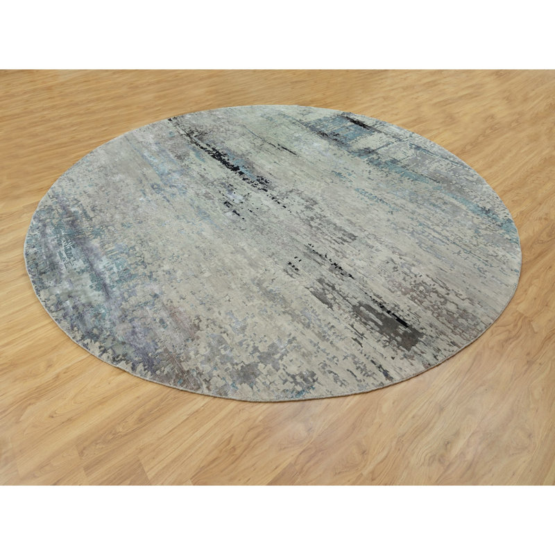 Tapis décoratif circulaire de noué à la main 12 pi en gris/bleu de conception unique chanie