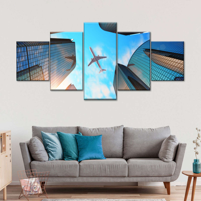 Avion sur des gratte-ciels, impression sur toile, 5 pièces, H 42 po x l 92 po x P 1 po
