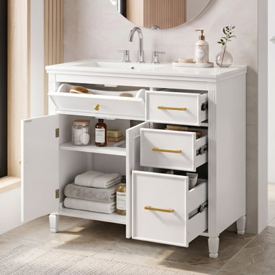 Meuble-lavabo avec lavabo en céramique lisse, trois tiroirs à fermeture amortie, poignées en métal, pieds en bois massif, tiroir basculant, tablette réglable