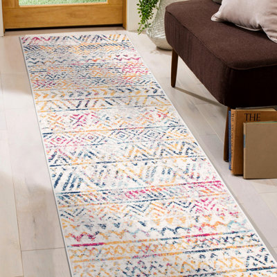 Tapis géométrique multicolore rose / jaune / ivoire