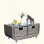 Table basse durable en verre trempé avec rotin en PE et structure en acier, parfaite pour les espaces de vie modernes à l'extérieur.