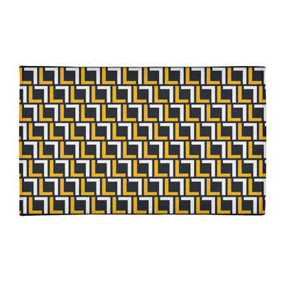 Tapis géométrique noir / jaune / blanc
