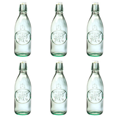 Ensemble de six bouteilles en verre embossées