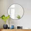 Miroir mural moderne à cadre rond-88045797-88291204