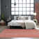 Solid Color Machine Woven Polypropylene Area Rug in Pink