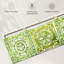 Carreaux ornementaux verts sur toile-1773165641