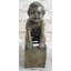 Figurine en bronze petit garçon espiègle sur chaise Eindhoven