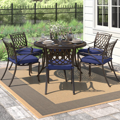 Arelli 6 - Person Patio Dining Set with Round Table , Cushions Included
