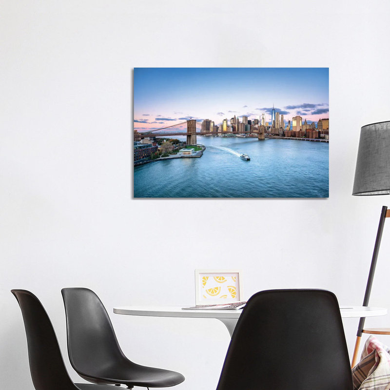 Brooklyn Bridge And Lower Manhattan Skyline On A Winter Morning by Jan Becke - Wrapped Canvas Print