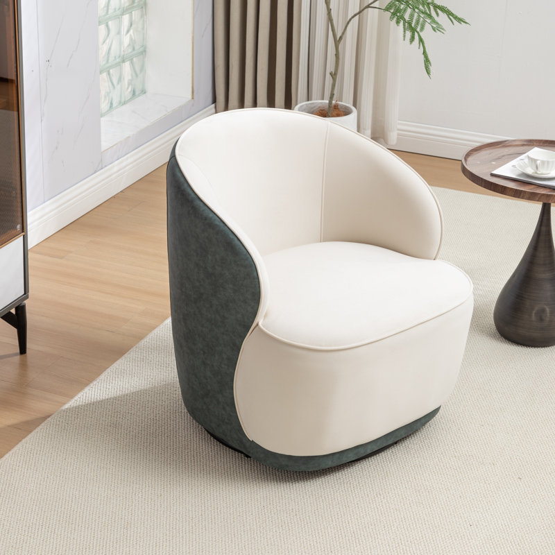 Fauteuil demi-tonneau pivotant en velours Stith, Velours bleu marine / beige