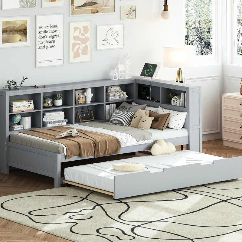 Lit de jour simple avec lit gigogne gris, espace de rangement et connecteur couleur bois et tablette