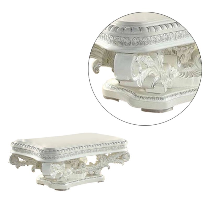 Kin 55" White Ornate Wood Coffee Table with Scrolled Pedestal
