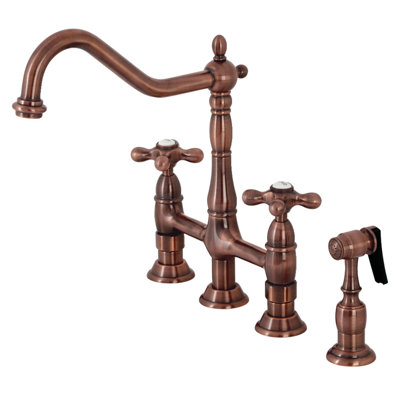 Kingston Brass Heritage Two-Handle 4-Hole Deck Mount Bridge Kitchen Faucet with Brass Side Sprayer