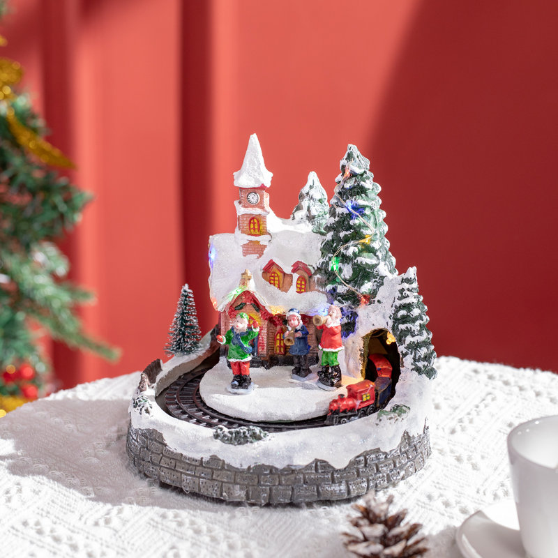 Scène animée de village de Noël