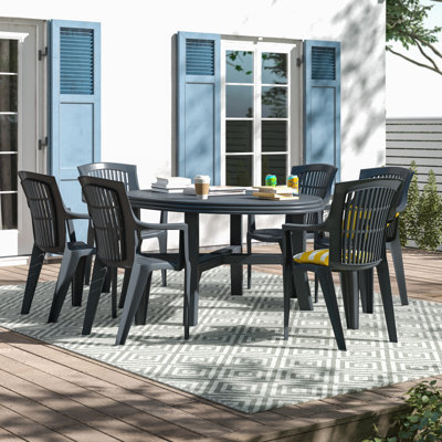 Wynell 6 - Person Patio Dining Set with Oval Table