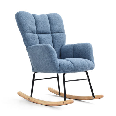 Chaise berçante rembourrée en bleu pour un espace de bureau apaisant