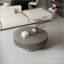 Table basse ronde avec rangement caché