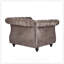 Fauteuil club Chesterfield avec capitonnage à boutons profonds et accoudoirs roulés, rembourré pour plus de confort et d'élégance