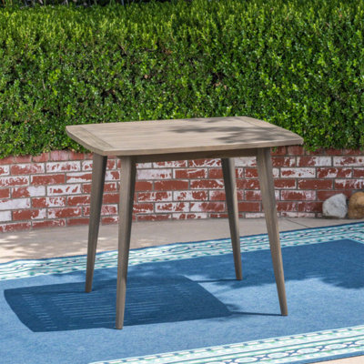 Table de salle à manger d'extérieur carrée en bois d'acacia avec pieds droits