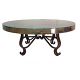 Luxurious Wrought Iron Coffee Table embellished with a 48” Round Oxidized Copper Top