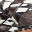 Breyen Cowhide Patchwork Area Rug in Black/White/Brown-1453417518
