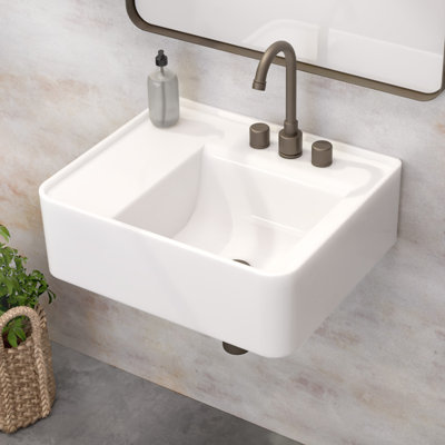 Lavabo de salle de bain mural rectangulaire de 22 po avec options de perçage de robinet et emplacement de drain central arrière Whitehaus Collection