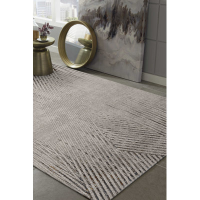 Tapis d'intérieur tissé à la machine ivoire / gris 5 pi 3 po x 7 pi 7 po Dezzarae