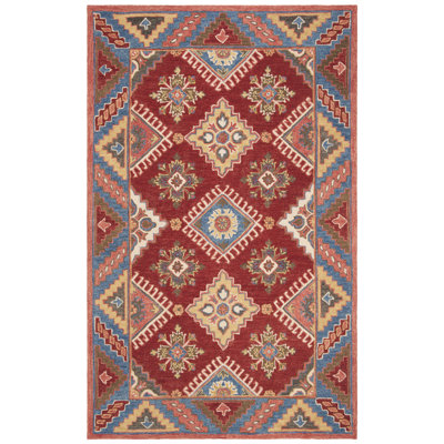 Vahakn Hand Tufted Wool/Cotton Southwestern Rug in Blue/Red
