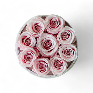 Arrangement floral rose en boîte