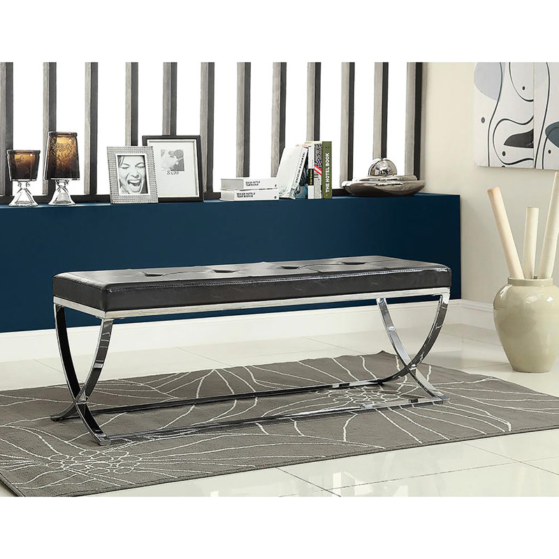 Élégant banc rembourré noir avec pieds courbés et finition contemporaine