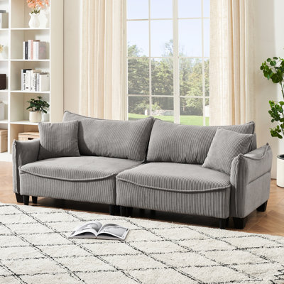 Velours côtelé gris confortable avec des lignes modernes - Deux coussins de style contemporain rehaussent le décor de votre salon