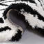Tapis noir / blanc à poils longs Delane-23513812