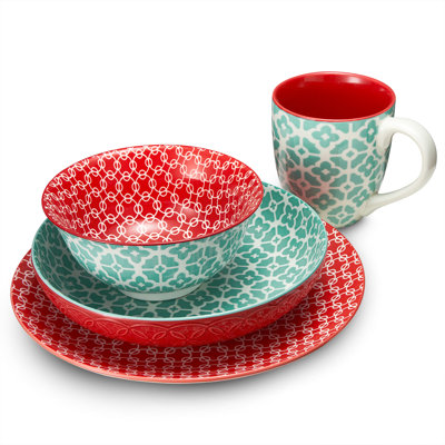 Porcelain dinner plate, bowl and mug in a bright geometric pattern